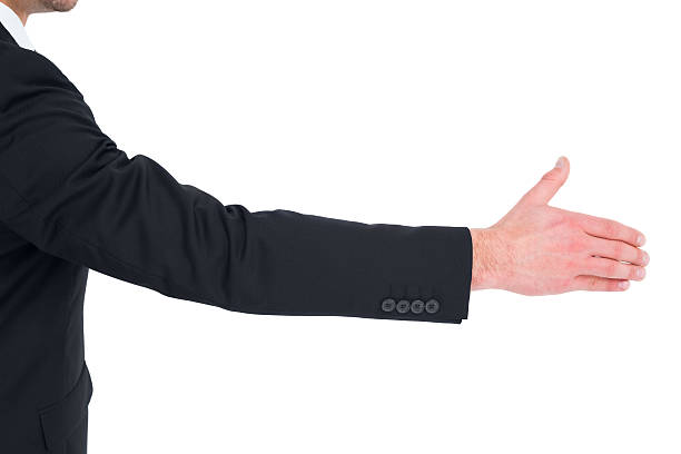 istock Businessman in suit offering his hand 468595714