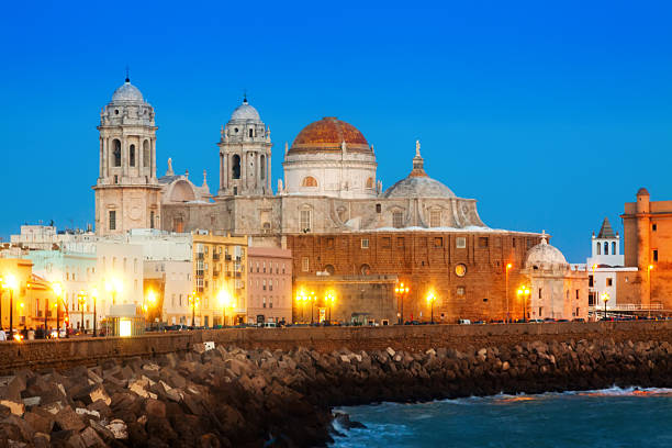 istock Cathedral and  embankment in evening time. Cadiz 468600820