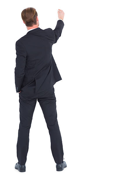istock Rear view businessman writing with chalk 468600952