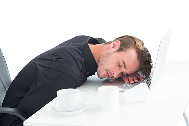 istock Tired businessman sleeping on laptop 468601466