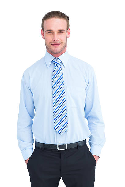 istock Cheerful businessman posing with hands in pockets 468601586