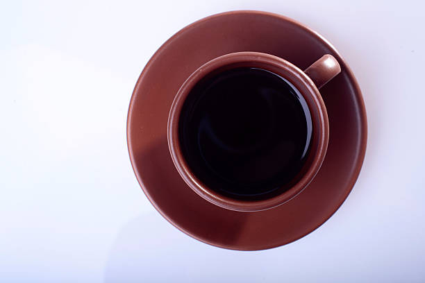 istock cup of coffee on white background 468605584