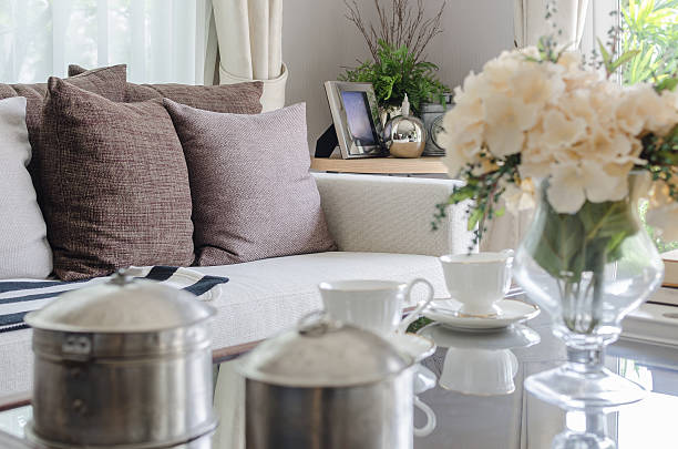 istock white sofa with brown pillows in living room 468605780