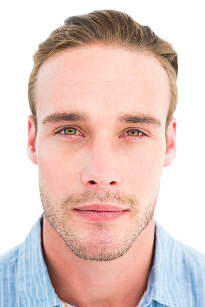 istock Calm man in shirt looking at camera 468606162