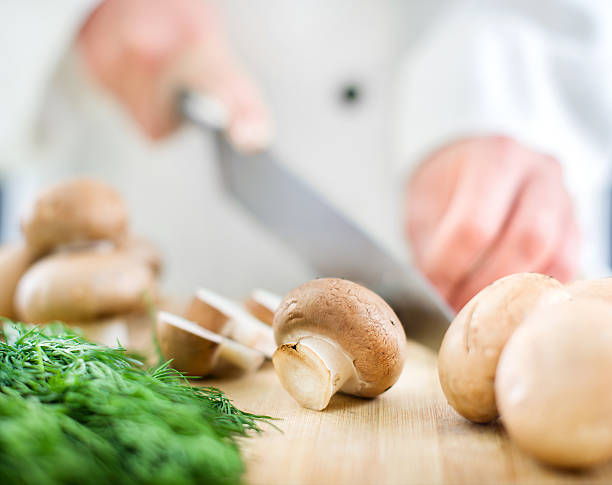 istock Mushrooms being prepared on a cutting board 468606618