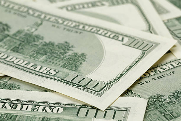 istock lots of one hundred dollar banknotes, background 468607138
