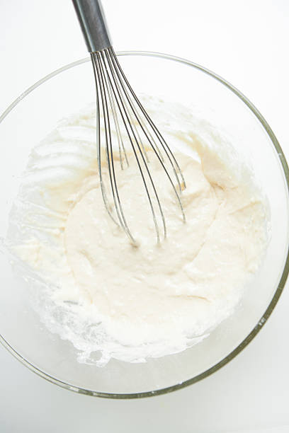 istock Preparing pancakes, whisk and dough in bowl 468608114