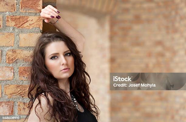 Portrait Of Beautiful Woman In Black Stock Photo - Download Image Now - 20-24 Years, 20-29 Years, 2015