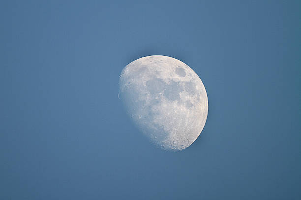 day time moon stock photo