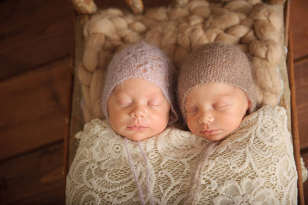 istock Newborn Twin Girls 468611320