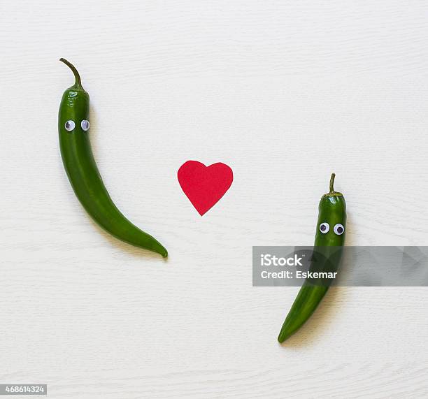 Hot Pepper Couple Stock Photo - Download Image Now - 2015, Adult, Cheerful