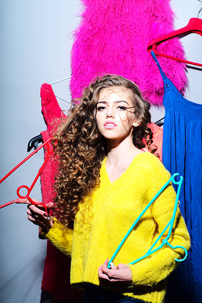 istock Fashionable woman with her clothes 468615936