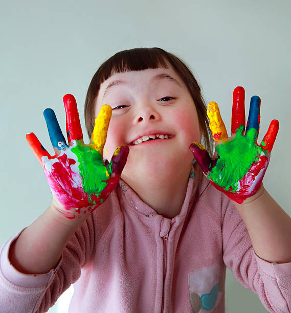 istock Cute little girl with painted hands. 468618520