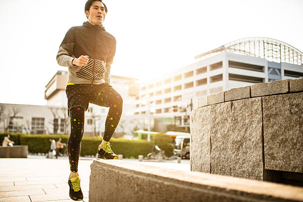 istock Japanese man doing step up on the city 468621220