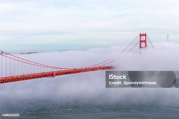 Golden Gate Bridge With Low Fog San Francisco Stock Photo - Download Image Now - Fog, Golden Gate Bridge, 2015