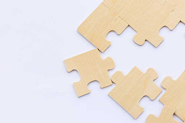 istock Wooden puzzle on white background 468624856