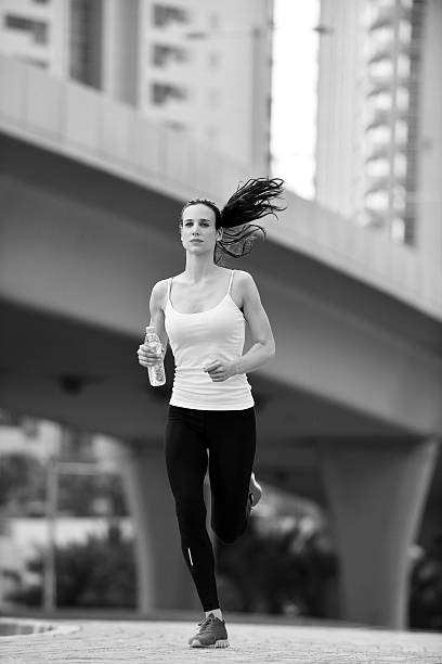 istock woman jogging at morning 468625481