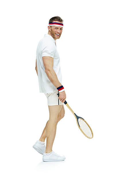 istock Smiling male tennis player looking at camera 468631764