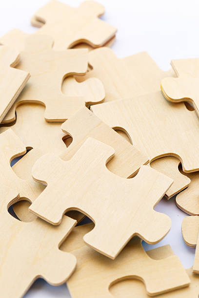 istock Wooden puzzle on white background 468634828