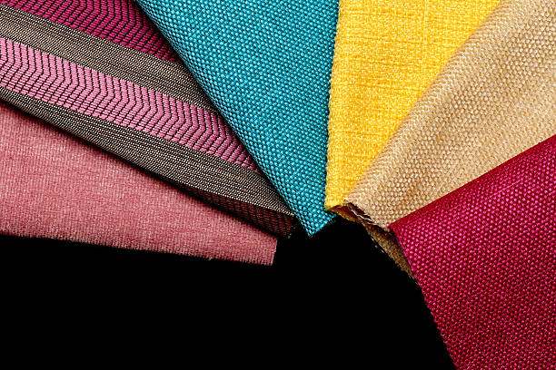 istock pieces of cloth of different colors on a black table 468637972