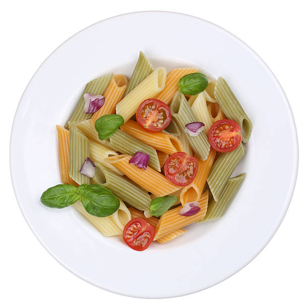 istock Colorful Penne Rigate noodles pasta meal isolated 468638176