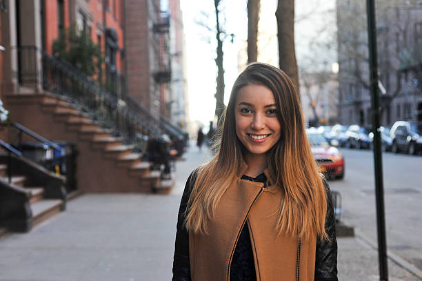 istock Young Woman Looking into the Camera 468641840