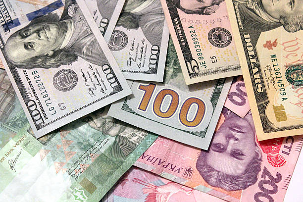 istock American dollars on grivnas bank notes 468643960