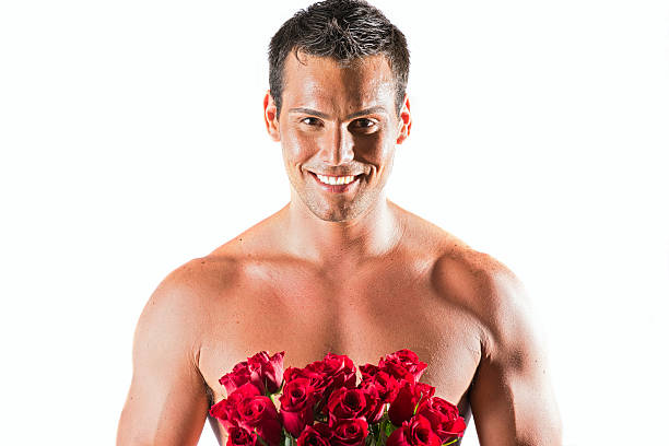 índio americano homem segurando um bouquet de rosas - men male masculinity indian culture imagens e fotografias de stock