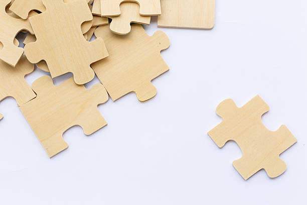 istock Wooden puzzle on white background 468651372