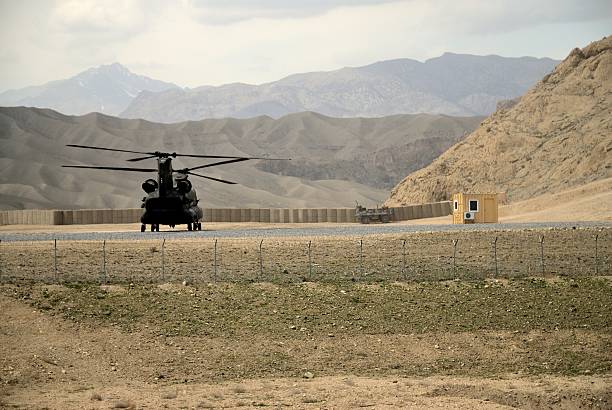 istock Military helicopter land on the Base. 468651422