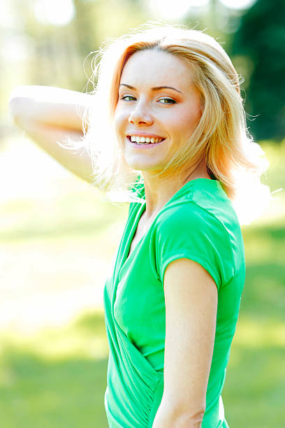 istock Smilng woman in park 468651778