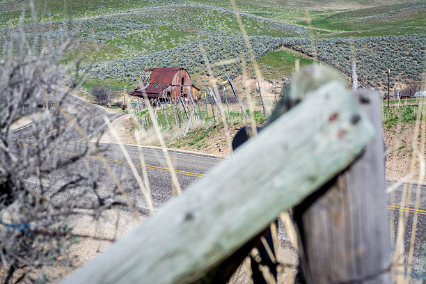 Country road and rusty old barn