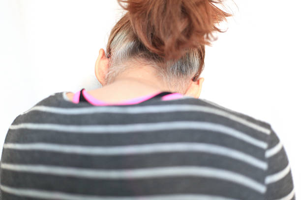 istock woman back side in a pony tail 468652440