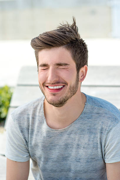 istock Portrait of a young man laghing 468652554