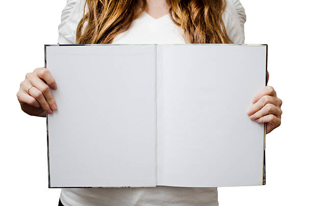 istock Woman holding blank book - White Background 468654133