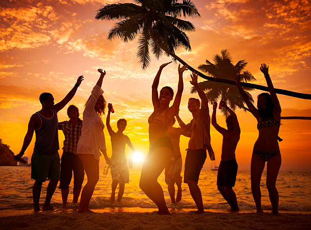 istock Diverse People Dancing and Partying on a Tropical Beach 468656816