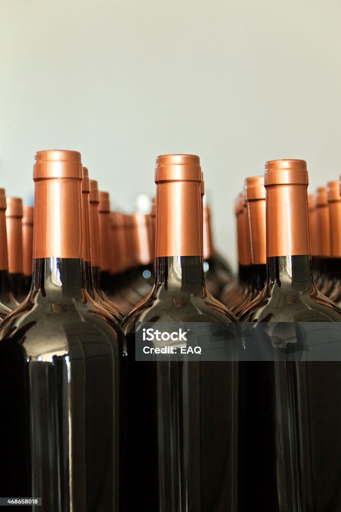Bottles of red wine Red wine bottles ordered for packaging. 2015 Stock Photo