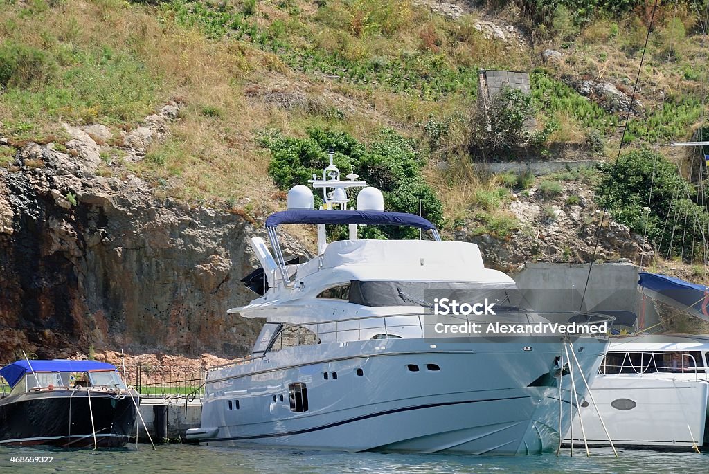 white boat over mountain white boat over mountain in Crimea 2015 Stock Photo