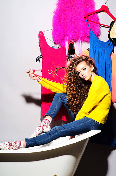 istock Fashionable woman with her clothes 468663000