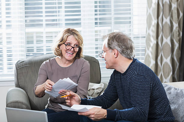 istock Mature couple paying bills at home 468663010