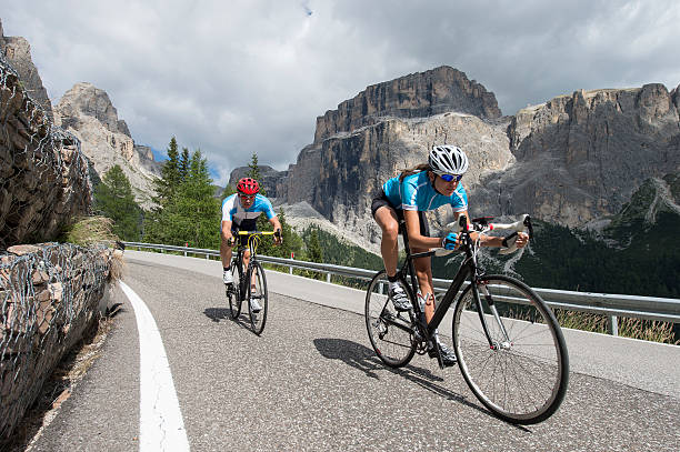 road cycling at the highest level road cycling in the iatian dolomites crank mechanism photos stock pictures, royalty-free photos & images