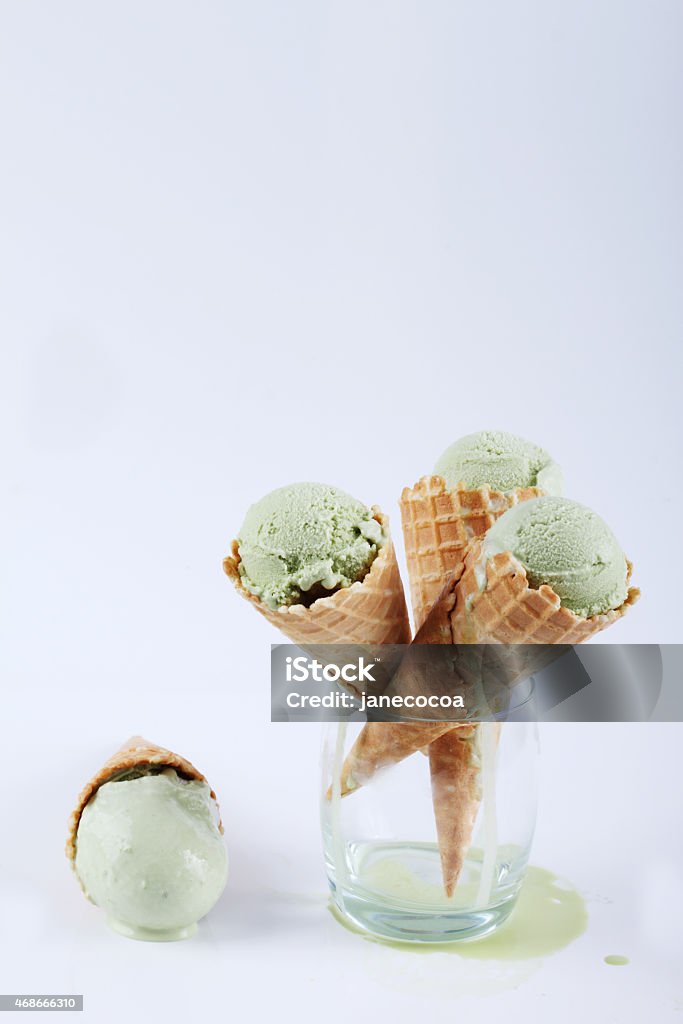green tea ice cream cones in clear glasses green tea ice cream cones in clear glasses on white background 2015 Stock Photo