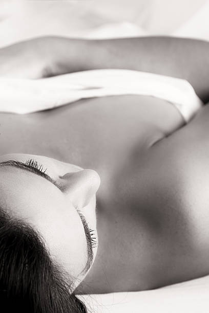 istock Boudoir on bed with sheet artistic conversion 468666877