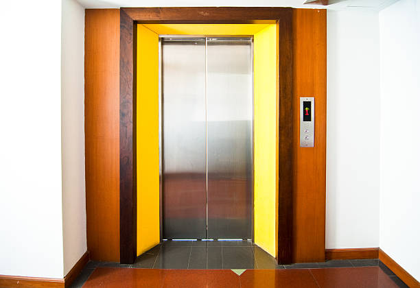 istock Front view of a modern elevator with closed doors 468667414