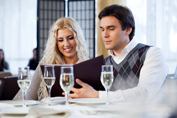 istock Young couple in restaurant 468668423