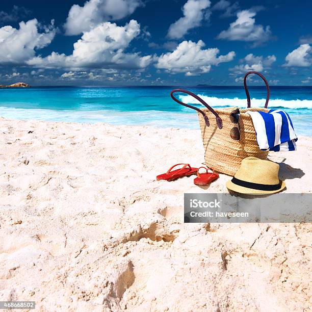 Beautiful Beach With Bag At Seychelles Stock Photo - Download Image Now - 2015, Activity, Bag