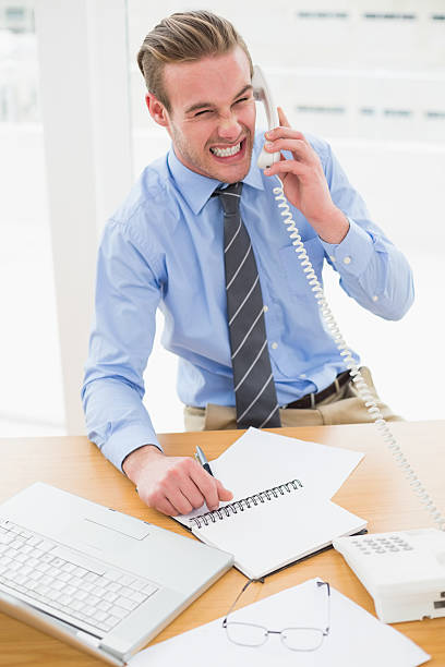istock Frustrated businessman on the phone 468670680