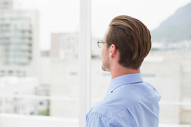 istock Businessman with glasses standing 468670748