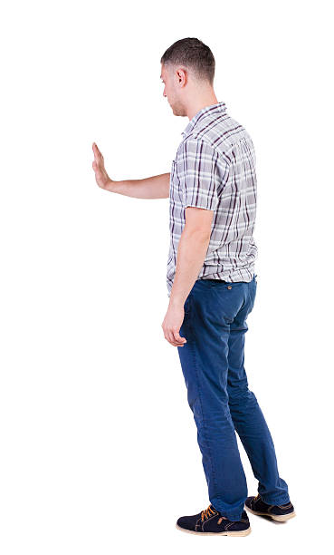 istock Back view of handsome man in shirt. 468673588