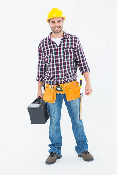 istock Happy male hanyman carrying toolbox 468674062
